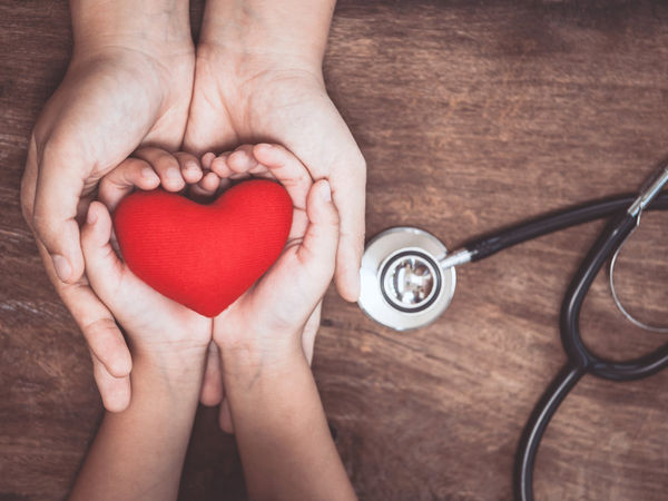 Hands holding heart